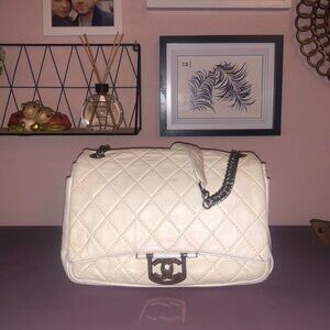 Available- Chanel icons secret label lambskin flap